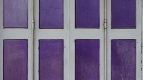 Old, rustic wall background with purple rectangles Foto stock