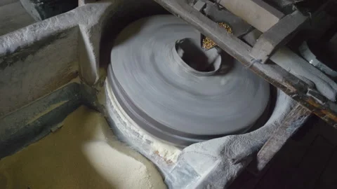 Old rustic wheat mill in function producing white flour 스톡 동영상 145157502