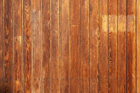 Old rustic wood paneling background with vertical wooden boards Stock Photos