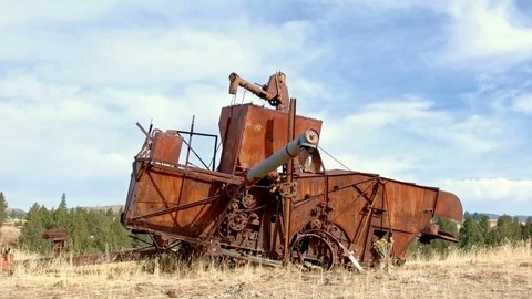 Old rusting combine tractor 1940 time lapse Western Ranch Oregon 33 Stock Footage 82019477