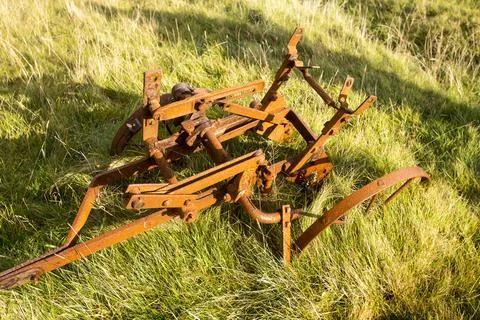 An old rusting farm implement at Balchrick, Sutherland, Scotland, UK. Foto stock