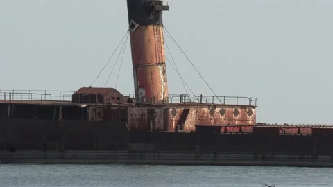Old rusting ship on the rocks at Port Credit Ontario Stock Footage 140001996