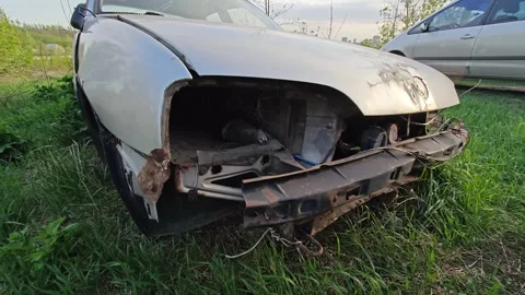 Old rusty abandoned car outside Video stock 273780124