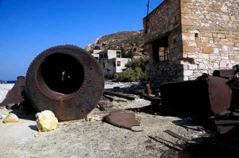 Old rusty abandoned machinery at a mining plant, Greece Stock Photos
