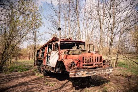 Old rusty abandoned Soviet fire truck in Chernobyl exclusion zone Stock Photos