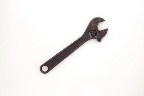 Old rusty Adjustable Wrench on white background. Stock Photos