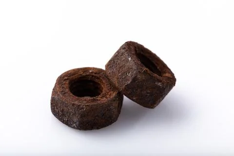 Old rusty aged bolt, not usable, rusty item on white background Stock Photos