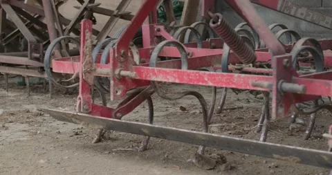 Old rusty agricultural machines. Farm household. Stock Footage 167583653