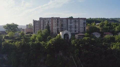 Old rusty and functioning ropeway or cable car cabins in Chiatura. Panorama of Video stock 130065627