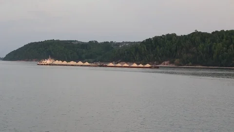 An old rusty barges sailing along the river Video stock 107910974