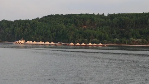 An old rusty barges sailing along the river Video stock 107911027