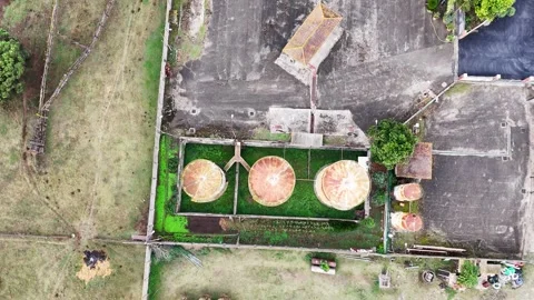 Old rusty barrels, old gas station, view from a drone Stock Footage 253723155