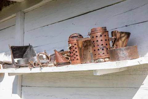 Old rusty beekeeping tools Stock Photos