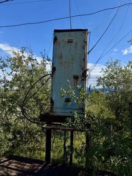 Old Rusty Blue Electrical Box in Nature Stock Photos