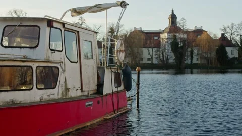 Old Rusty Boat In a German Harbor with Castle in the Background Stock Footage 169467945