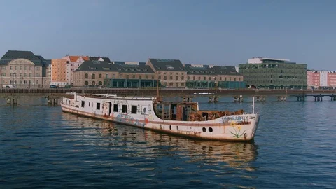 Old rusty boat on river Spree in Berlin Stock Footage 102588551