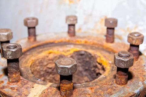 Old rusty bolt and nut on steel background 写真素材