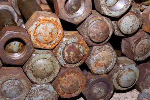 Old rusty bolt and nut on steel background Stock Photos