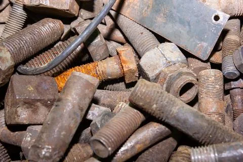 Old rusty bolt and nut on steel background 스톡 사진