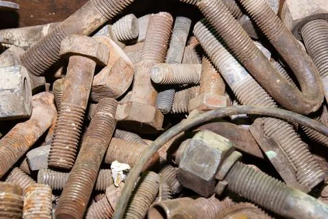 Old rusty bolt and nut on steel background Stockfoto's