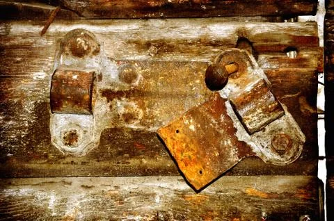 Old rusty bolt on worn door Stock Illustration