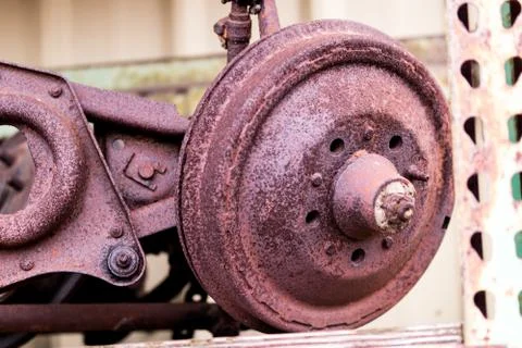 Old rusty brake drum on spindle Stock Photos