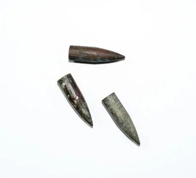 Old rusty bullets from Kalashnikov assault rifle. Stock Photos