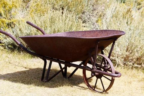 An old rusty cart from a mining mine. Stock Photos
