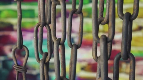 Old rusty chain on color background Stock Footage 79087206