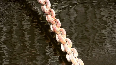 The Old rusty chain over water Stock Footage 36759674