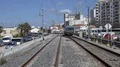 Old rusty city train passing by in Faro at Algarve, Portugal 4k or 4k+ Resolution