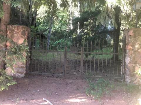 Old rusty decorated gate Stock Photos