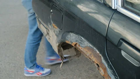 Old, rusty, deep blue car fender. Trash at the dump. Stock Footage 154254290