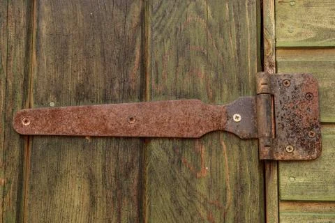 Old rusty door hinge. Stock Photos
