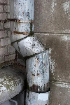 Old rusty drainpipe Stock Photos