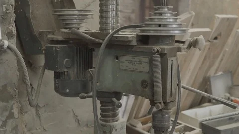 Old Rusty Electric Drill Machine in Wood Workshop | Slow Motion Stock Footage 108064102