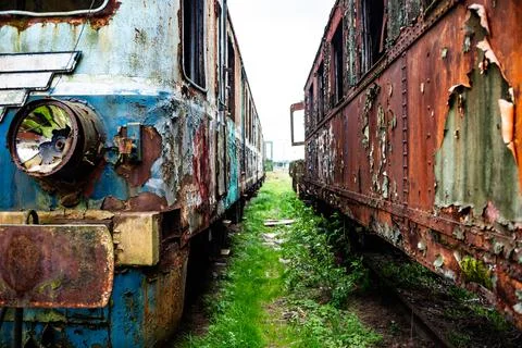 Old rusty electric train abandoned on unused siding Stock Photos