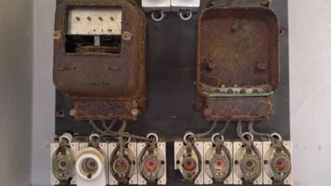 Old rusty electricity meter in an abandoned building. Ghost town Kolmanskop. Video stock 169666938