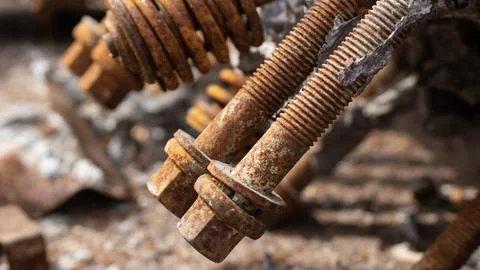 Old rusty engine bolts close up Stock Photos