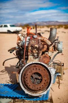 Old rusty engine in a Mojave desert junkyard Stock Photos