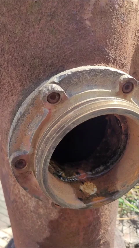 Old, rusty fire hydrant on a city sidewalk Stock Footage 336826705