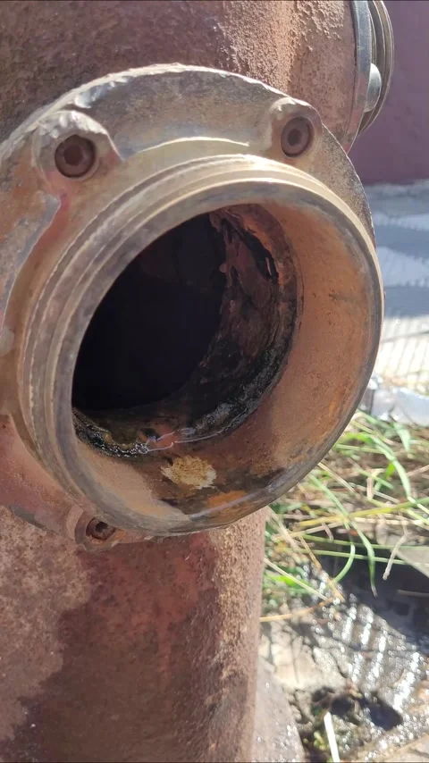 Old, rusty fire hydrant on a city sidewalk Stock Footage 336826706