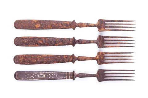 Old rusty fork on a white background Stock Photos
