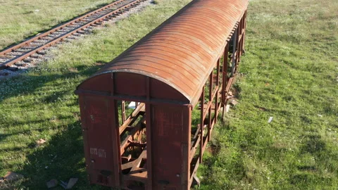 Old rusty freight car- covered railway wagon for transportation of goods Stock Footage 153804144