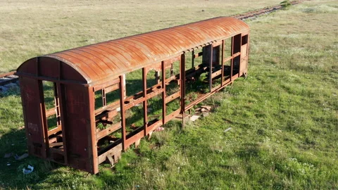 Old rusty freight car- covered railway wagon for transportation of goods Stock Footage 153808430