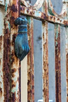 Old rusty front door with a distressed handle with patina Stock Photos