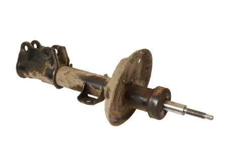 The old rusty front shock absorber Stock Photos