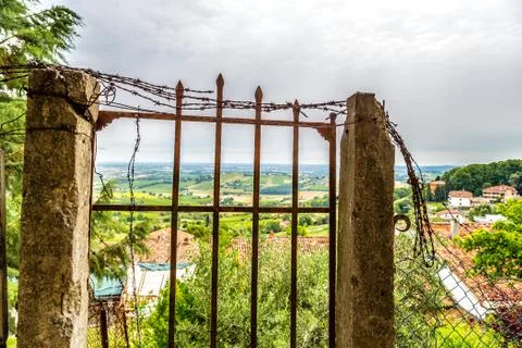 Old rusty gate in ruins Stock Photos