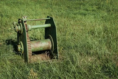 Old rusty gears in grass Stock Photos