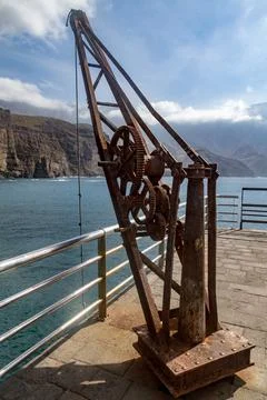 Old rusty harbour crane Stock Photos